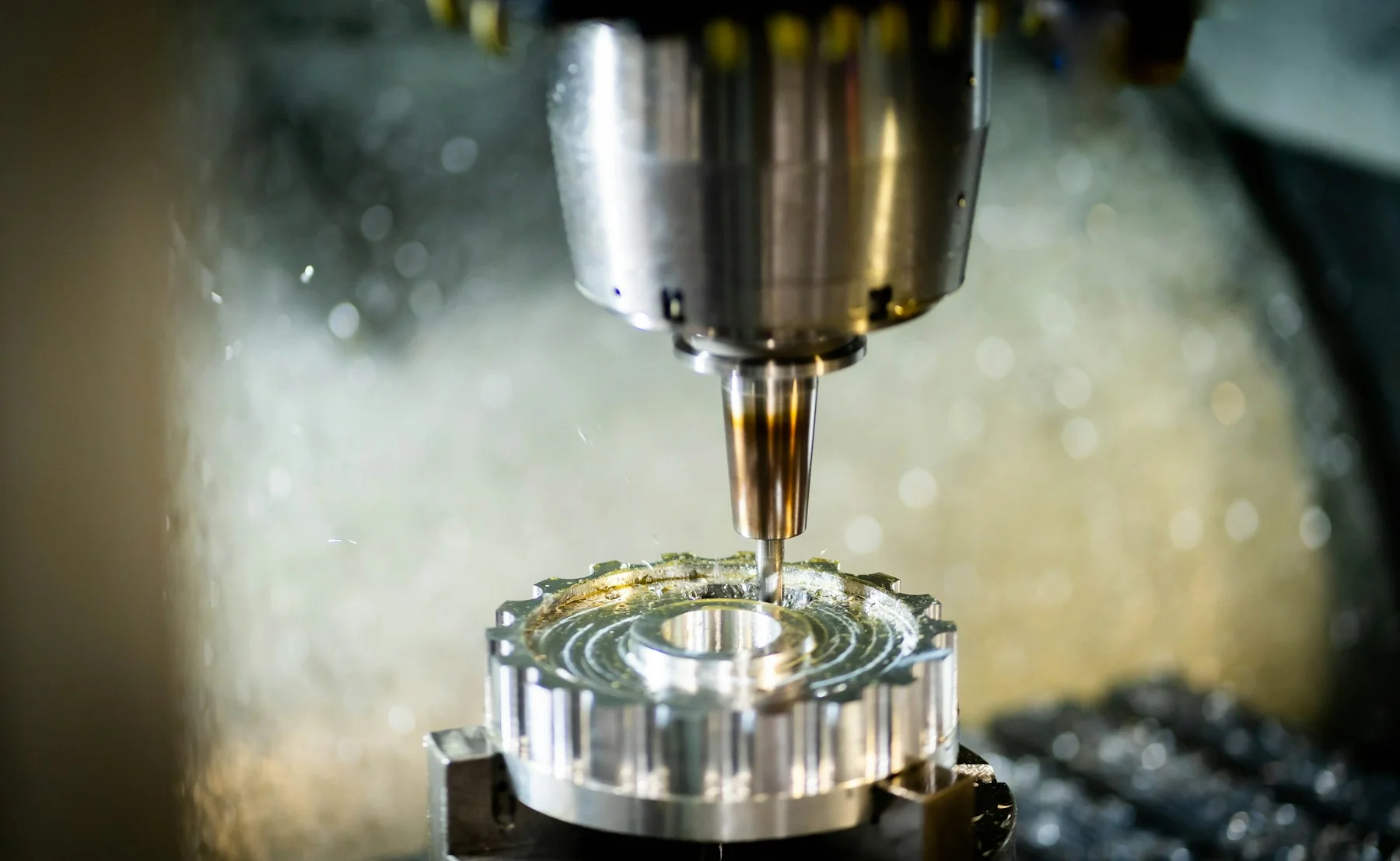 A CNC cutter machining the internal features of a metal component.